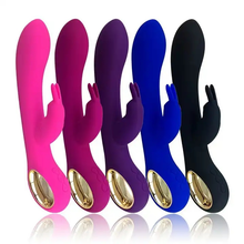 Ember rabbit vibrator showing controls and rechargeable base